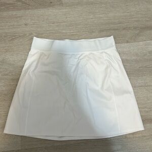TNA court micro skirt